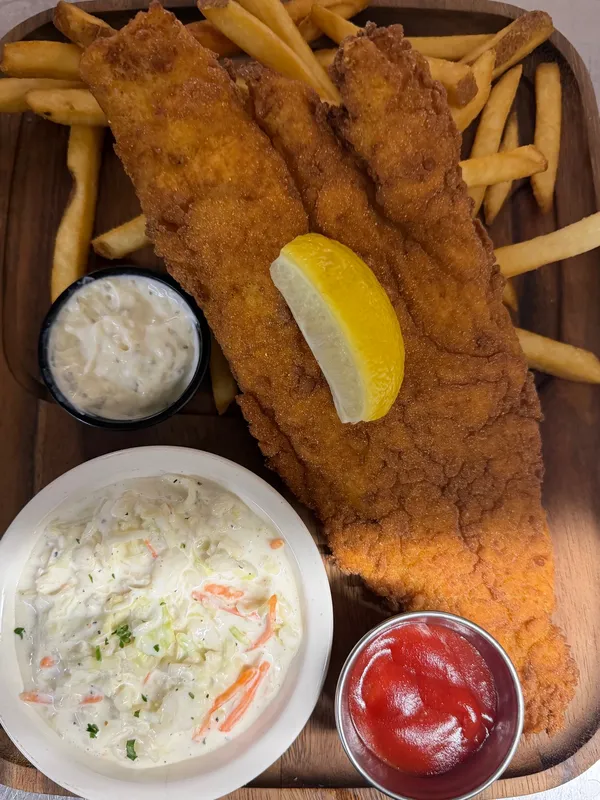 Fried haddock with fries, tartar and coleslaw
